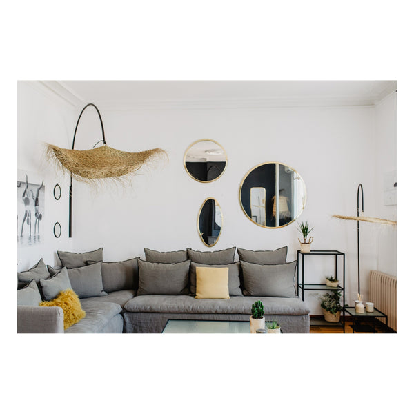 Espejo ovalado en latón